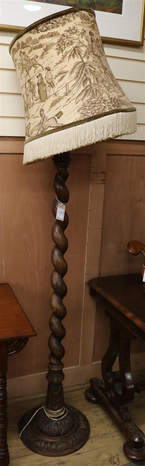 A barley twist standard lamp Width of base 35cm